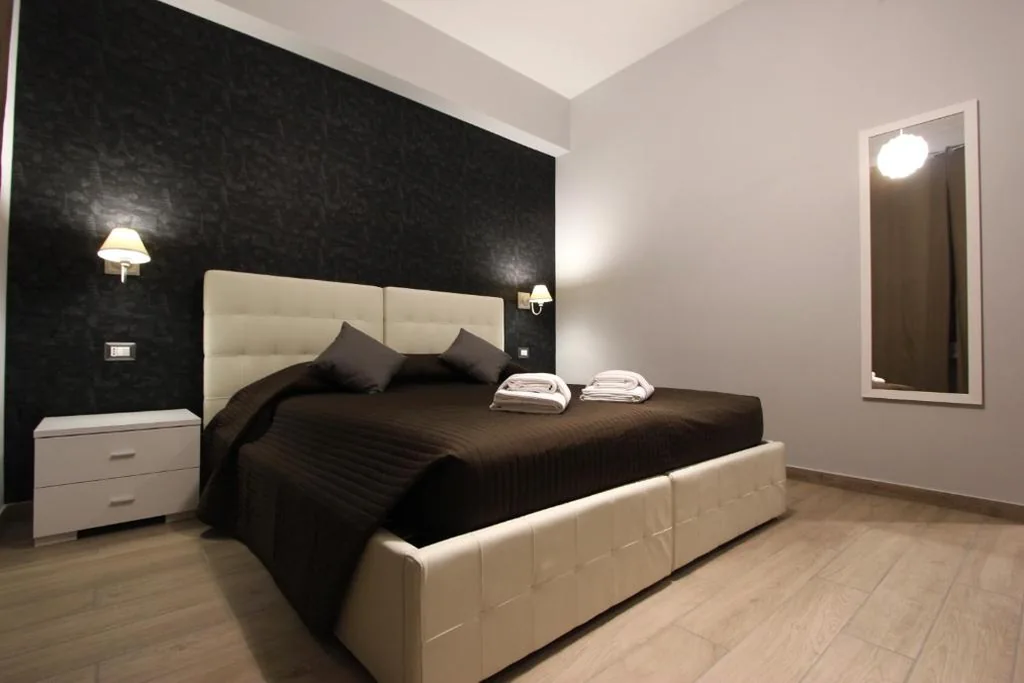 Deluxe Double/Twin Room with Single Beds — Pianeta Roma 127