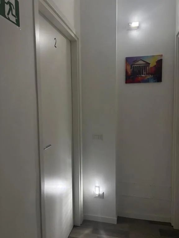 Camera Deluxe Matrimoniale/Doppia con Letti Singoli — PORTA FURBA Suites