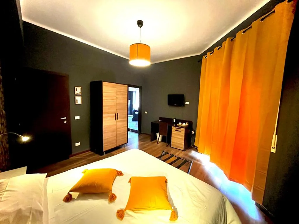 Camera Deluxe Matrimoniale/Doppia con Letti Singoli con Balcone — Prati Comfort