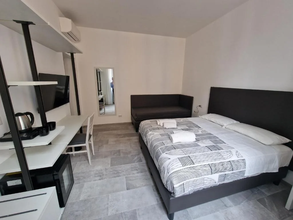 Camera Deluxe Matrimoniale/Doppia con Letti Singoli — Relux Pretoria Rooms