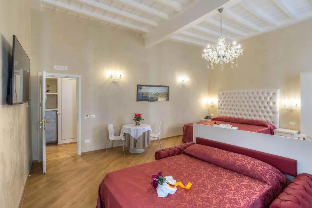Camera Deluxe Matrimoniale/Doppia con Letti Singoli — Trevi roma suites