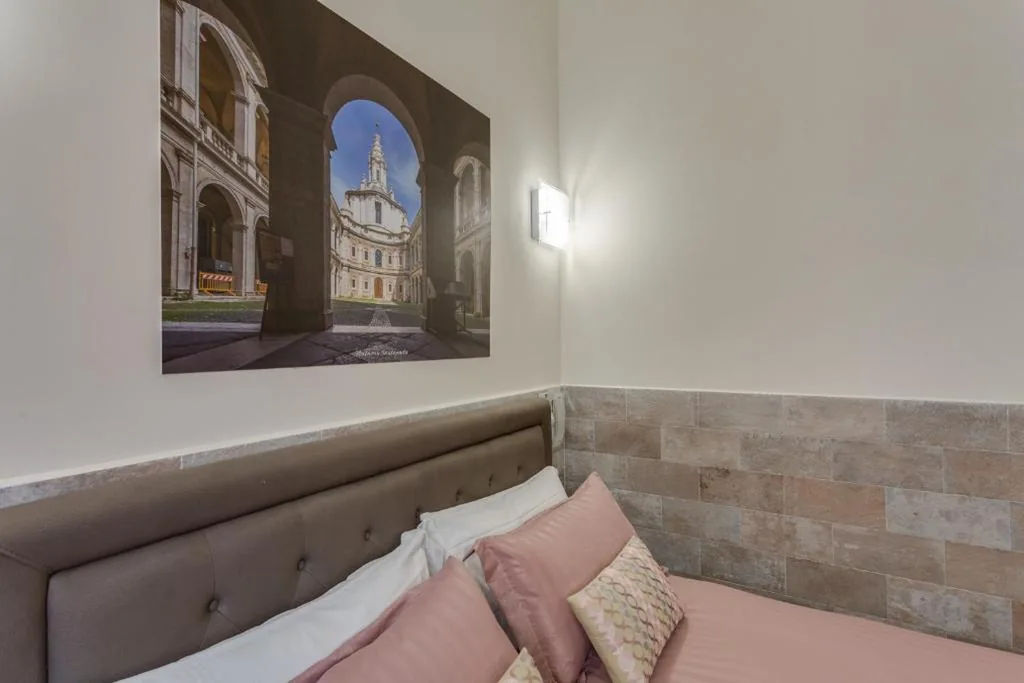 Camera Deluxe — Navona Charme Suite