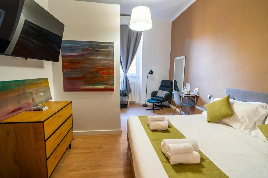 Camera Deluxe — NOI Luxury rooms Colosseum