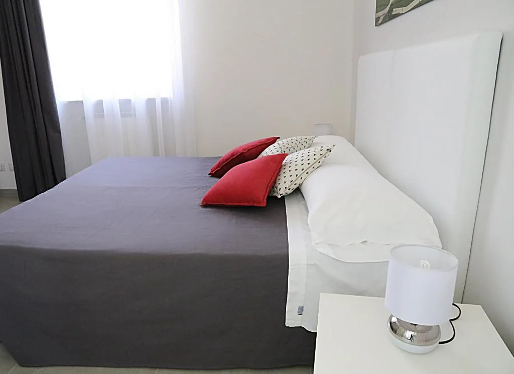 Deluxe Room — Quattro Stelle al Porto Guest House