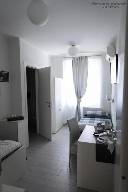 Camera Doppia con Letti Singoli — Affittacamere Villa Marcella