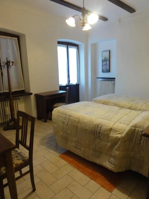 Camera Doppia con Letti Singoli con Bagno Privato Esterno — Ristorante Buasca
