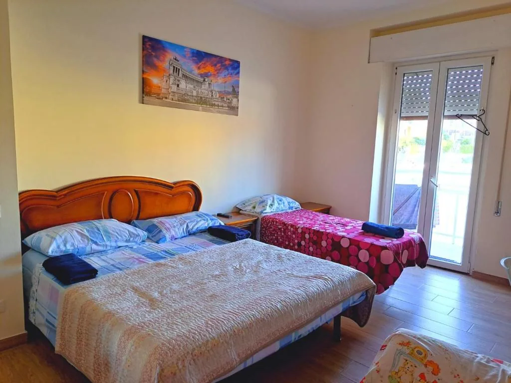 Twin Room with Balcony — Cozy Rooms Rome