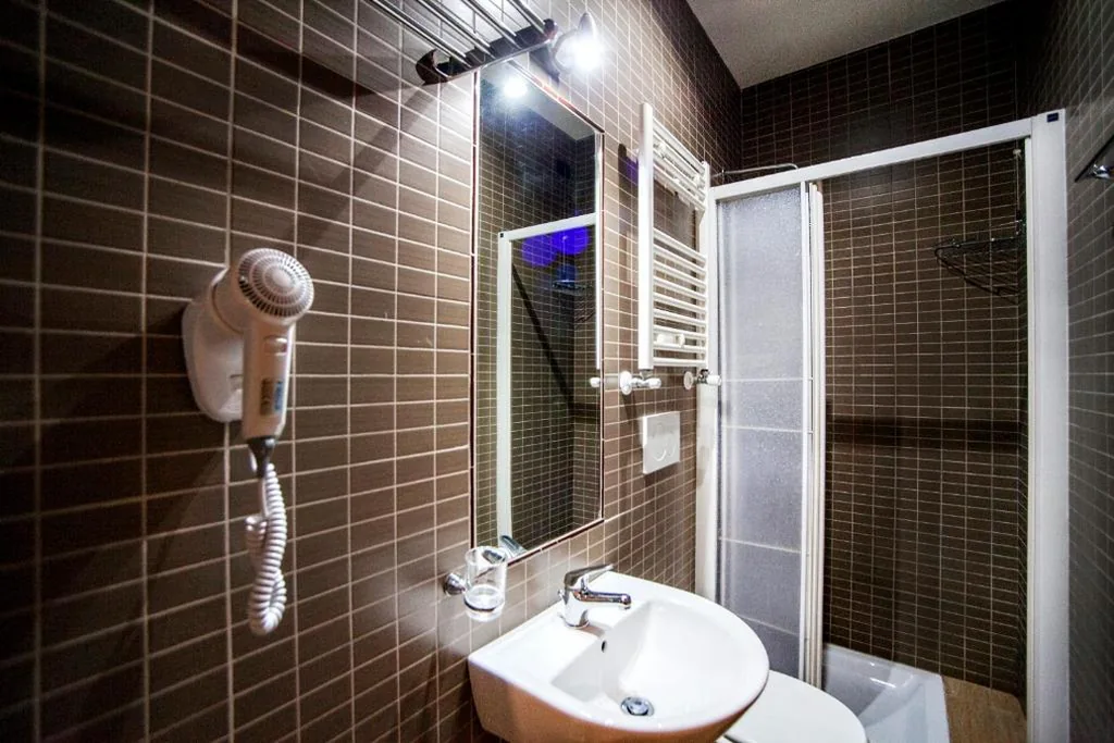 Twin Room with Shared Bathroom — Funny Holiday Guest House