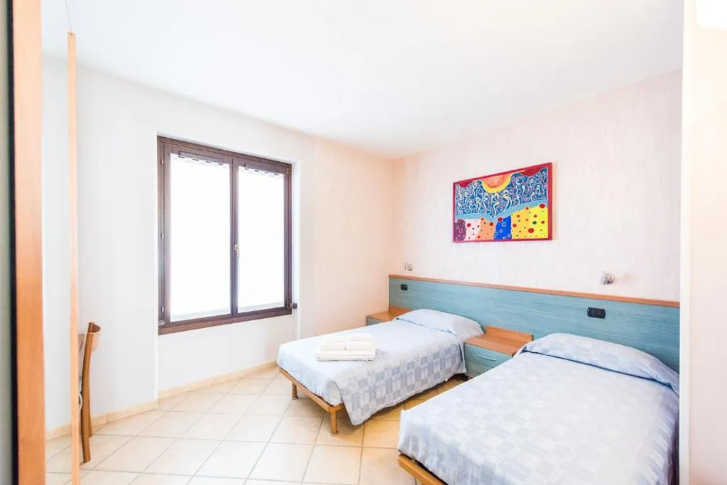 Twin Room — Hotel Bacco