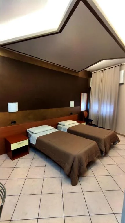 Twin Room — Hotel Emiliana