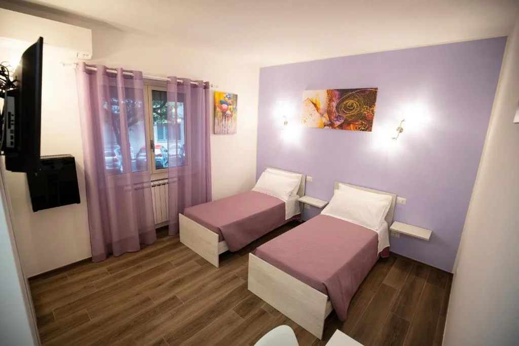 Twin Room — ROMECOMING Ostiense Guest House