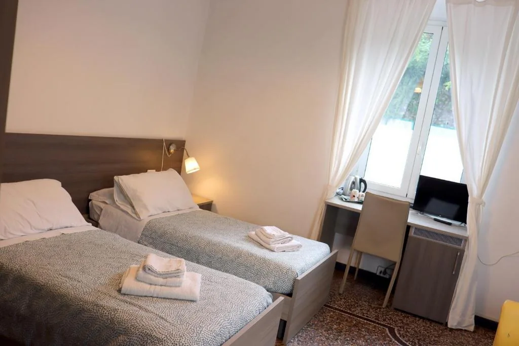 Camera Doppia con Letti Singoli Spaziosa — ALBERGO LOCANDA DIANA