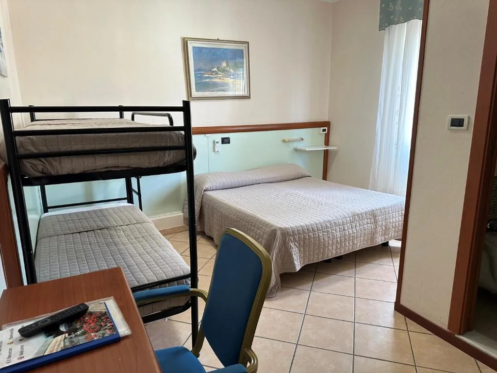 Economy Quadruple Room - Annexe — Hotel Svizzera