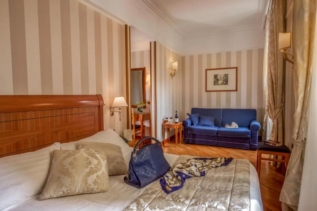 Family Room (2 Adults + 1 Child) — Albergo Ottocento