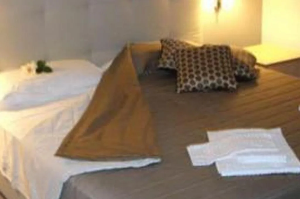 Family Room (2 Adults + 1 Child) — Hotel Desiderio