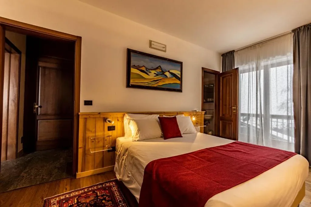 Family Room (2 Adults + 1 Child) — Hotel & Restaurant Le Charaban