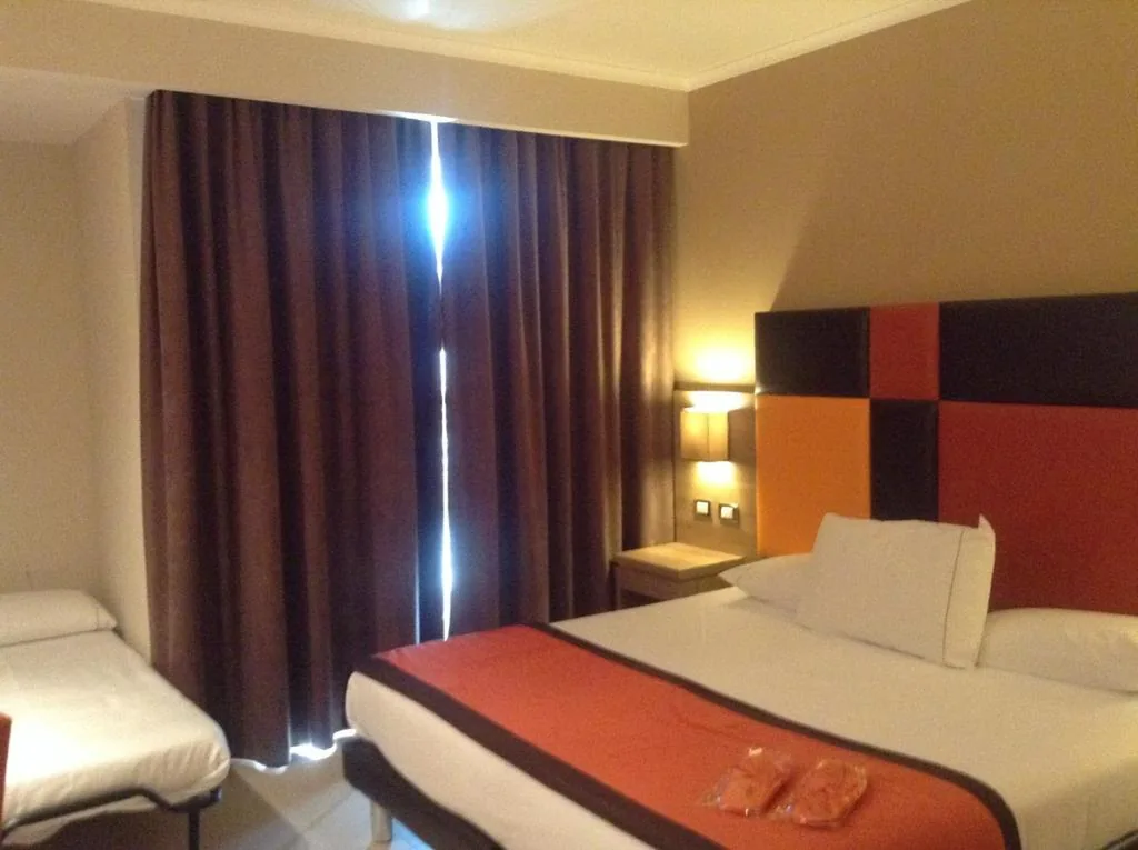 Family Room (2 Adults + 1 Child) — Hotel Tiber Rooftop & Wellness