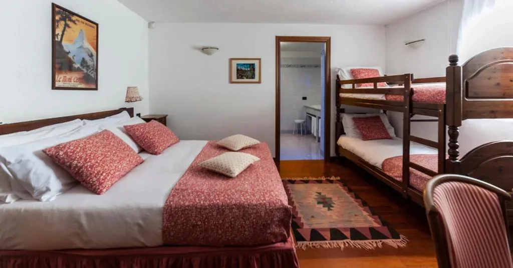Family Room (2 Adults + 2 Children) — Hotel Baita Cretaz