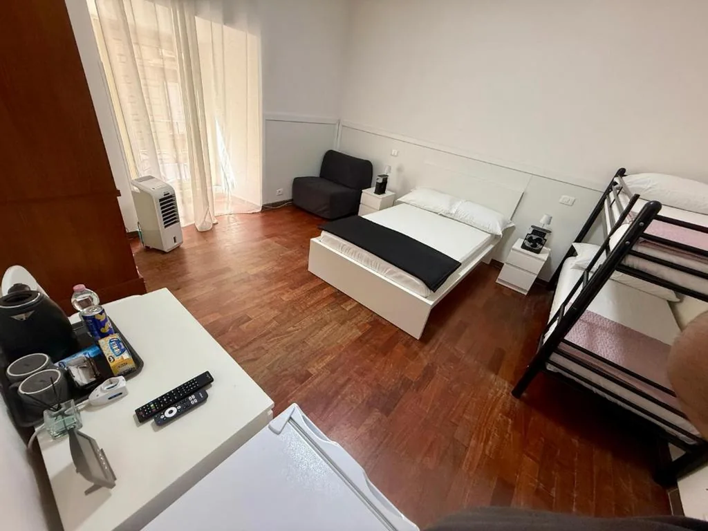 Family Room with Private Bathroom — Roma Comfort Inn