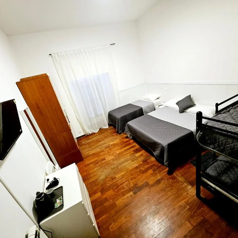 Family Room with Private Bathroom — Roma Comfort Inn