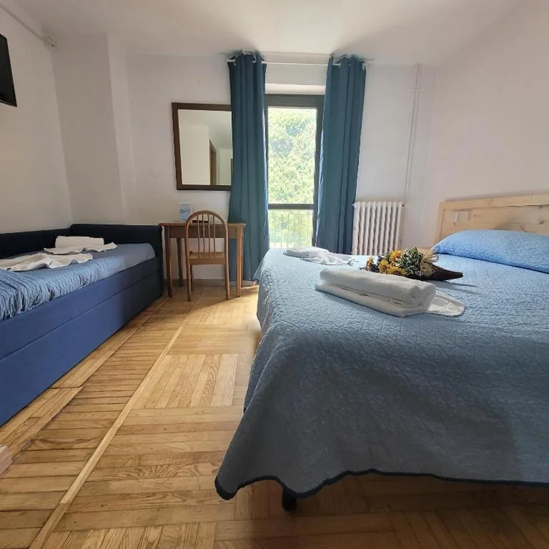 Camera Familiare con Balcone — Chalet Monte Nebius