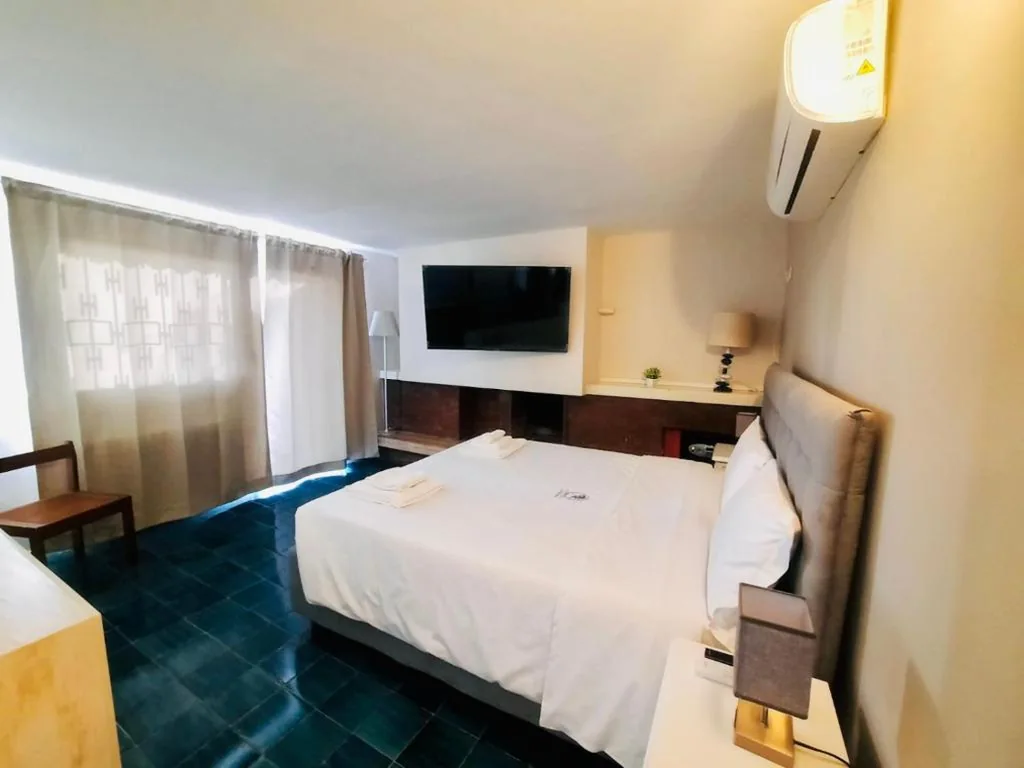 Camera Familiare con Terrazza — Relais La Fornarina 2