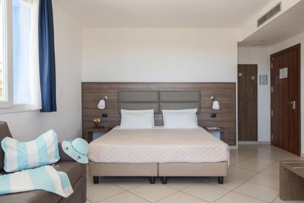Family Room with Sea View — Ai Pozzi Village & SPA