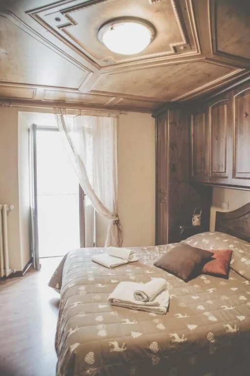 Camera Familiare con Vista Montagna — Hotel Residence Giardini