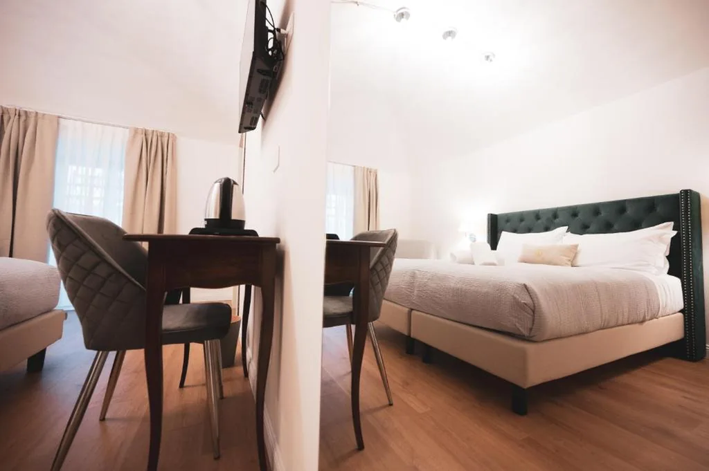 Camera Familiare Deluxe — Carlo Felice Boutique Hotel