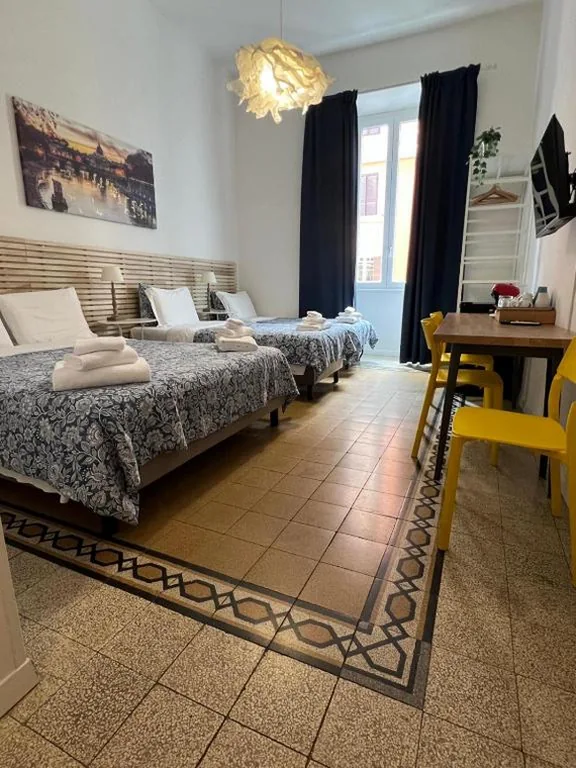 Camera Familiare Deluxe — MiRhome Guest House