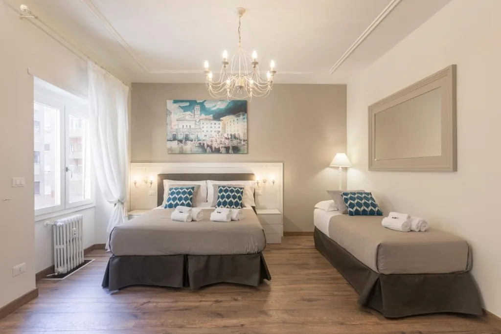 Camera Familiare Deluxe — Trastevere Gallery Suites