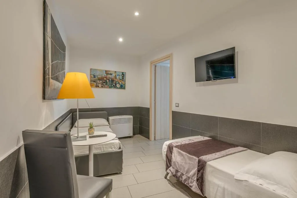 Camera Familiare Deluxe — Trevi Palace Hotel