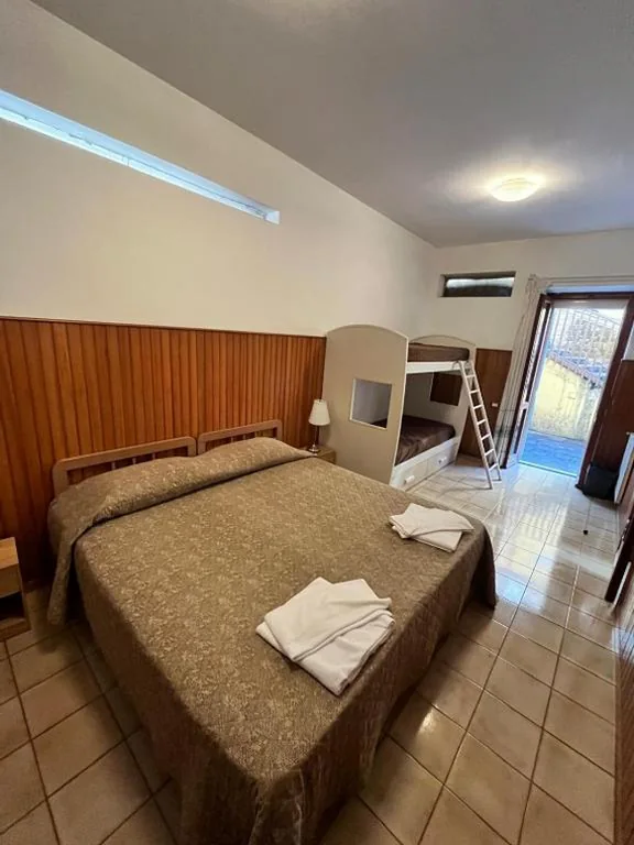 Economy Family Room — Domus Getsemani