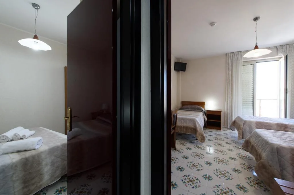 Camera Familiare — Hotel Casa Tra Noi
