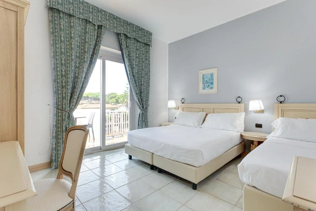 Camera Familiare — Hotel Cavalluccio Marino