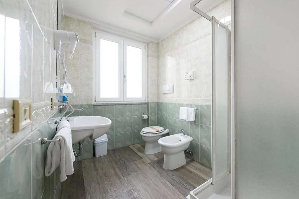 Camera Familiare Quadrupla — Hotel Casa Tra Noi
