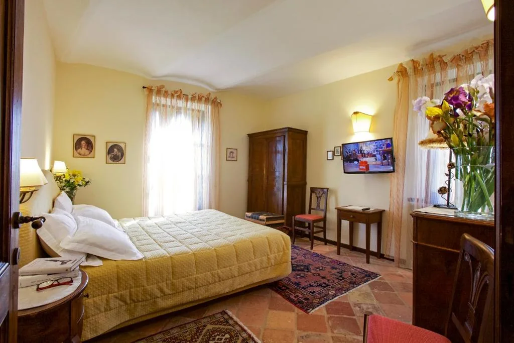 Camera Familiare — Relais Castello di Razzano