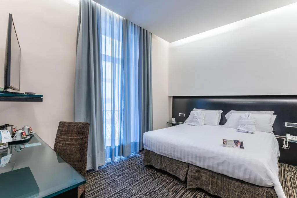 Camera Familiare Superior — Best Western Plus Hotel Universo