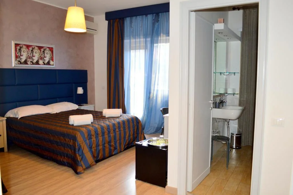 Camera Familiare Superior — Check-Inn Rooms