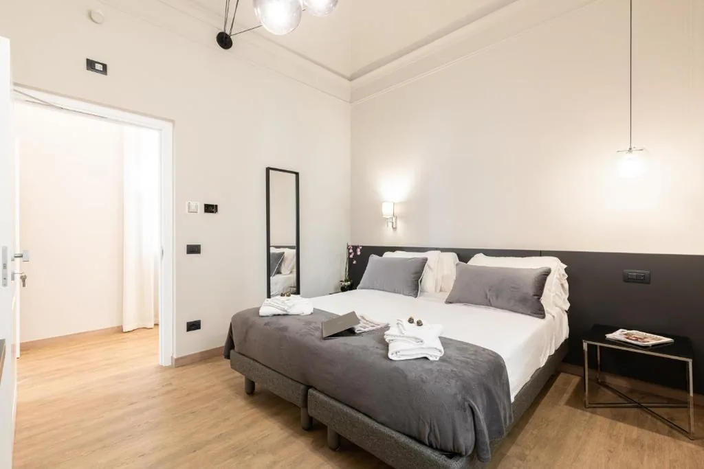 Camera Familiare Superior — Foresteria di Piazza Cavour – Luxury Suites & Guest House
