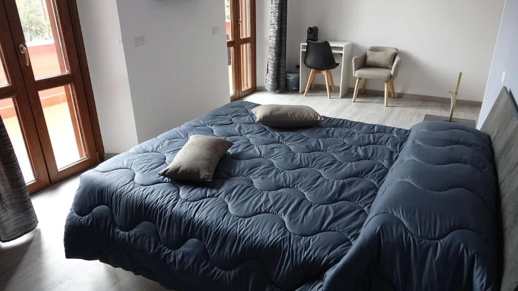 King Room with Balcony — Podere Monfalcone guest house