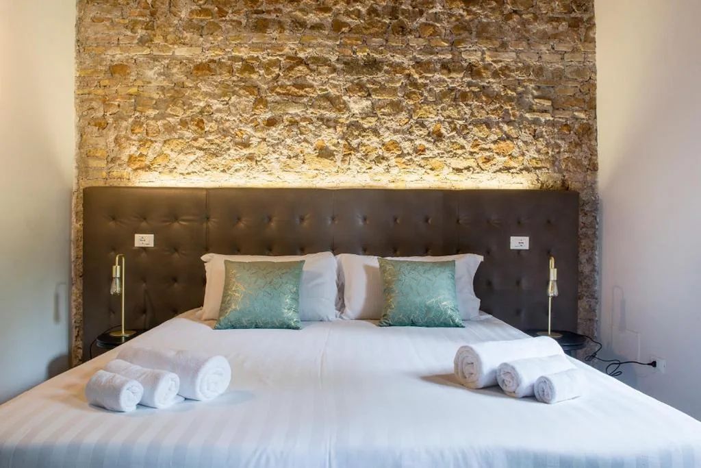 King Room with Garden View — Beyond Colosseum