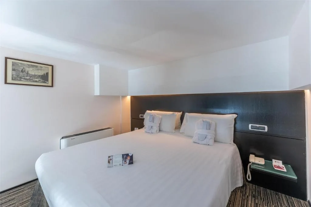 Camera King Deluxe — Best Western Plus Hotel Universo
