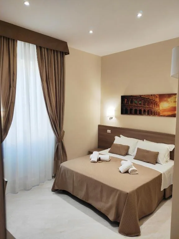 Camera King Deluxe — Luxury Suites – Stay Inn Rome Experience