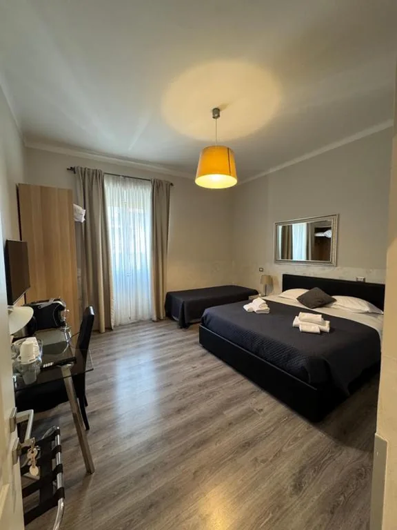 King Deluxe Room — RHS Rienzo Suites