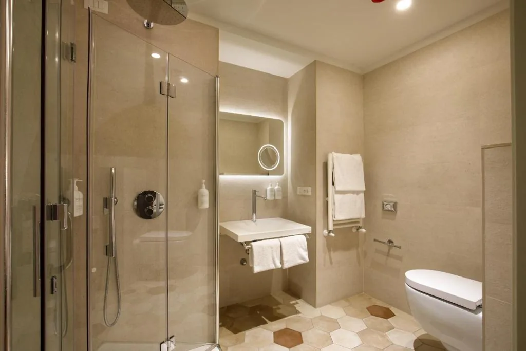 King Superior Room with Armchair-Bed - Accessible — Cosmopolita Rome Colosseum, Tapestry Collection by Hilton