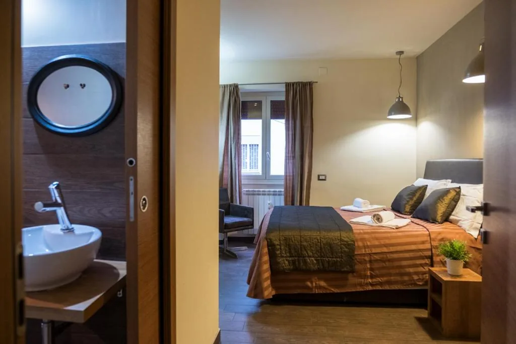 Camera Matrimoniale — Aida Charming Rooms