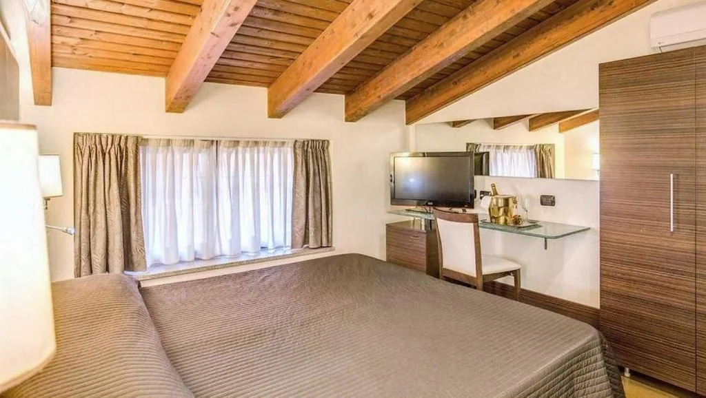 Budget Double Room — The Strand Hotel