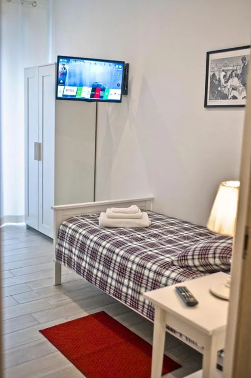 Double Room with Shared Bathroom — Fellini