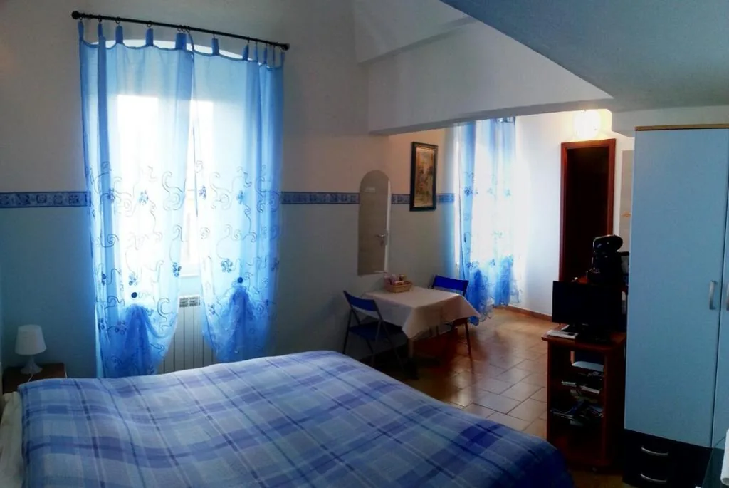 Double Room with Private Bathroom — Guest House “In Piazzetta da Vasco”